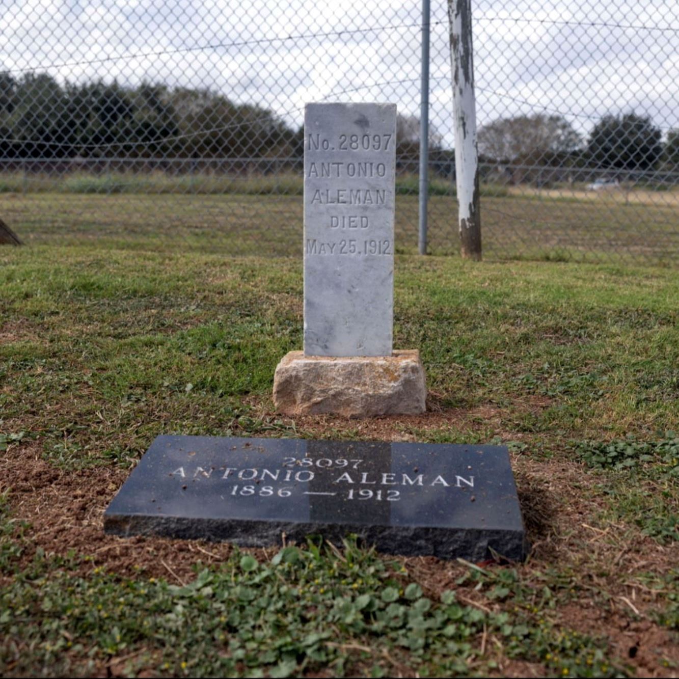 Post-Restoration of Antonio Aleman's gravestone and pillow marker in 2023