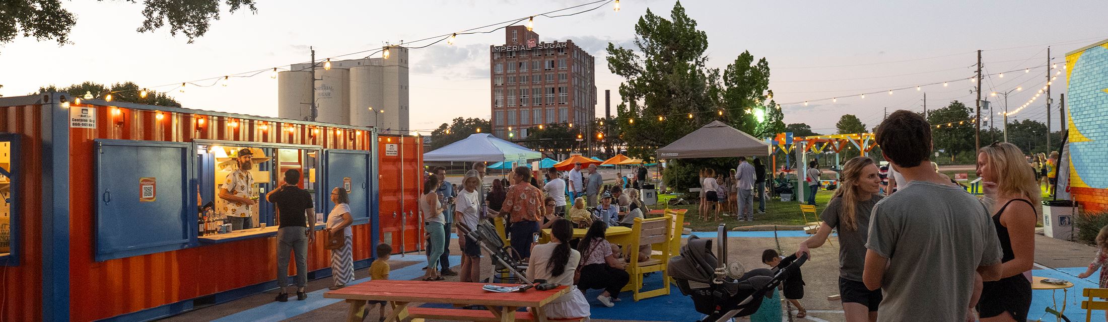 Residents Mingle and Enjoy Refreshments at Better Block Event