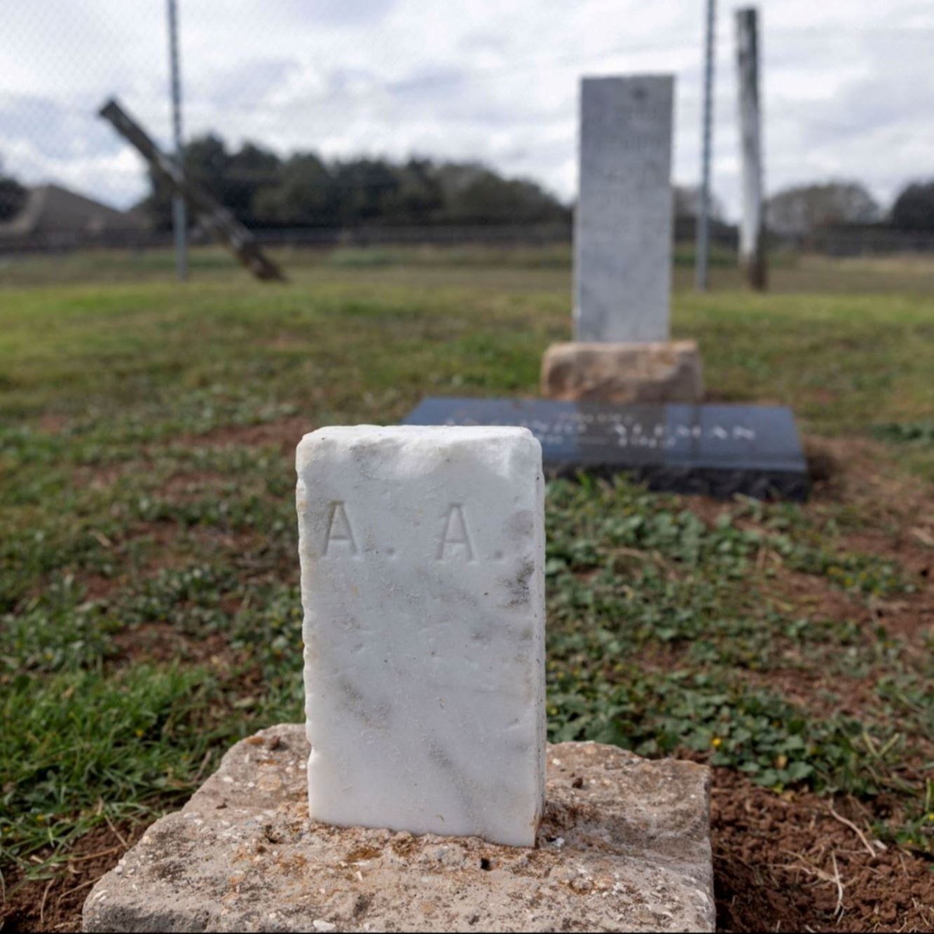 Post-Restoration of Antonio Aleman's footstone in 2023