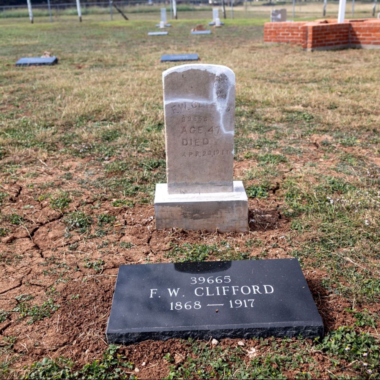 Post-Restoration of F. W. Clifford's gravestone and pillow marker in 2023