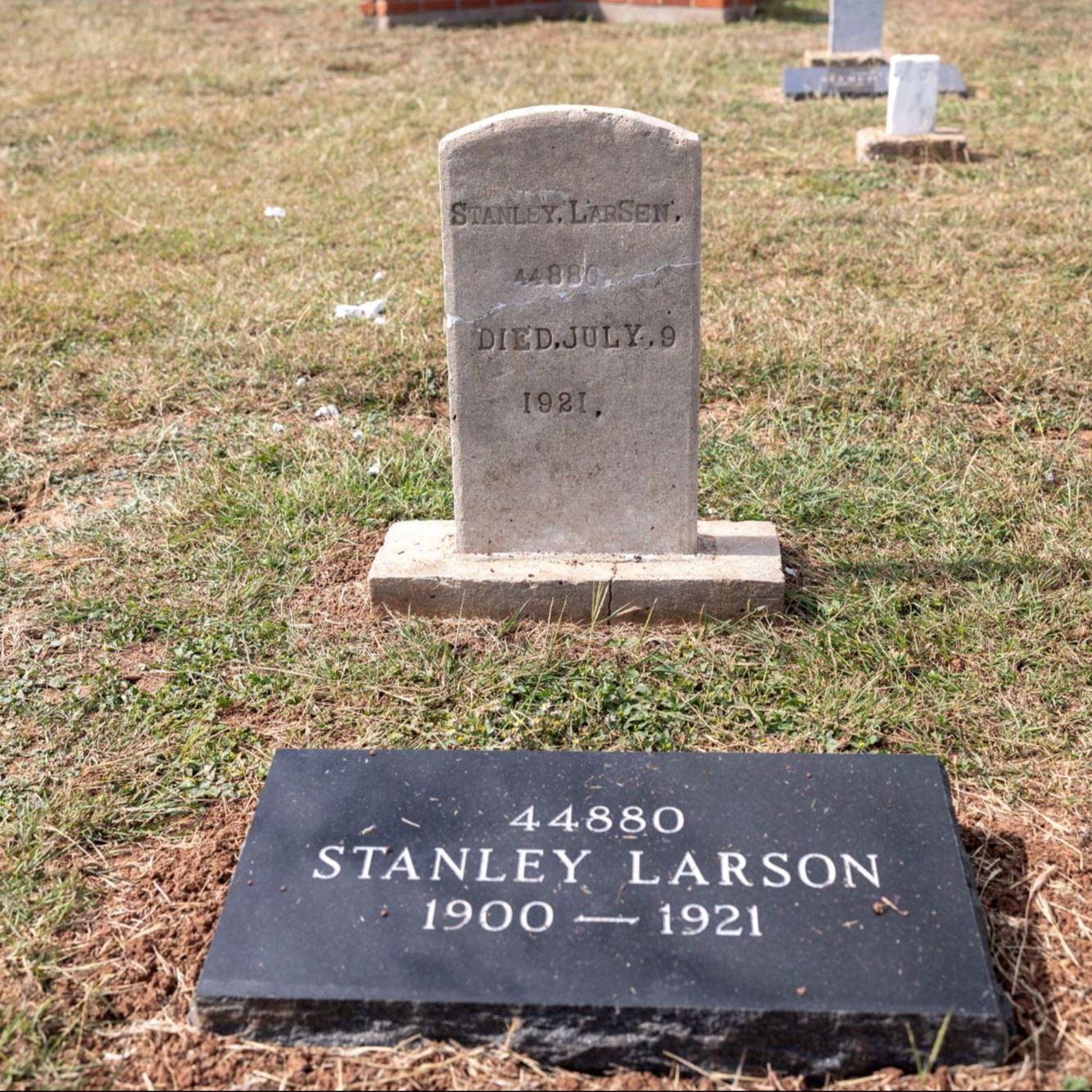 Post-Restoration of Stanley Larson's gravestone and pillow marker in 2023