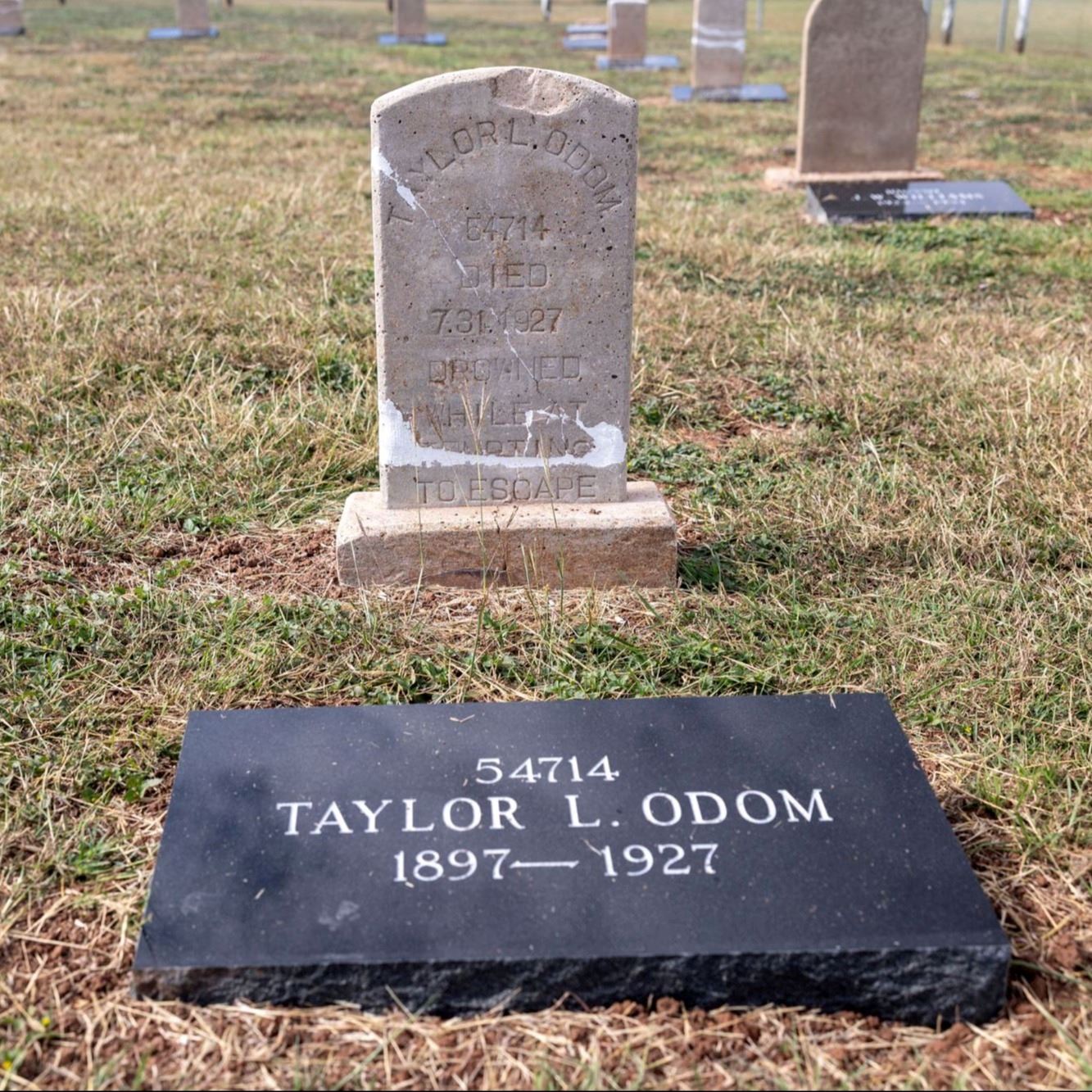 Post-Restoration of Taylor L. Odom's gravestone and pillow marker in 2023