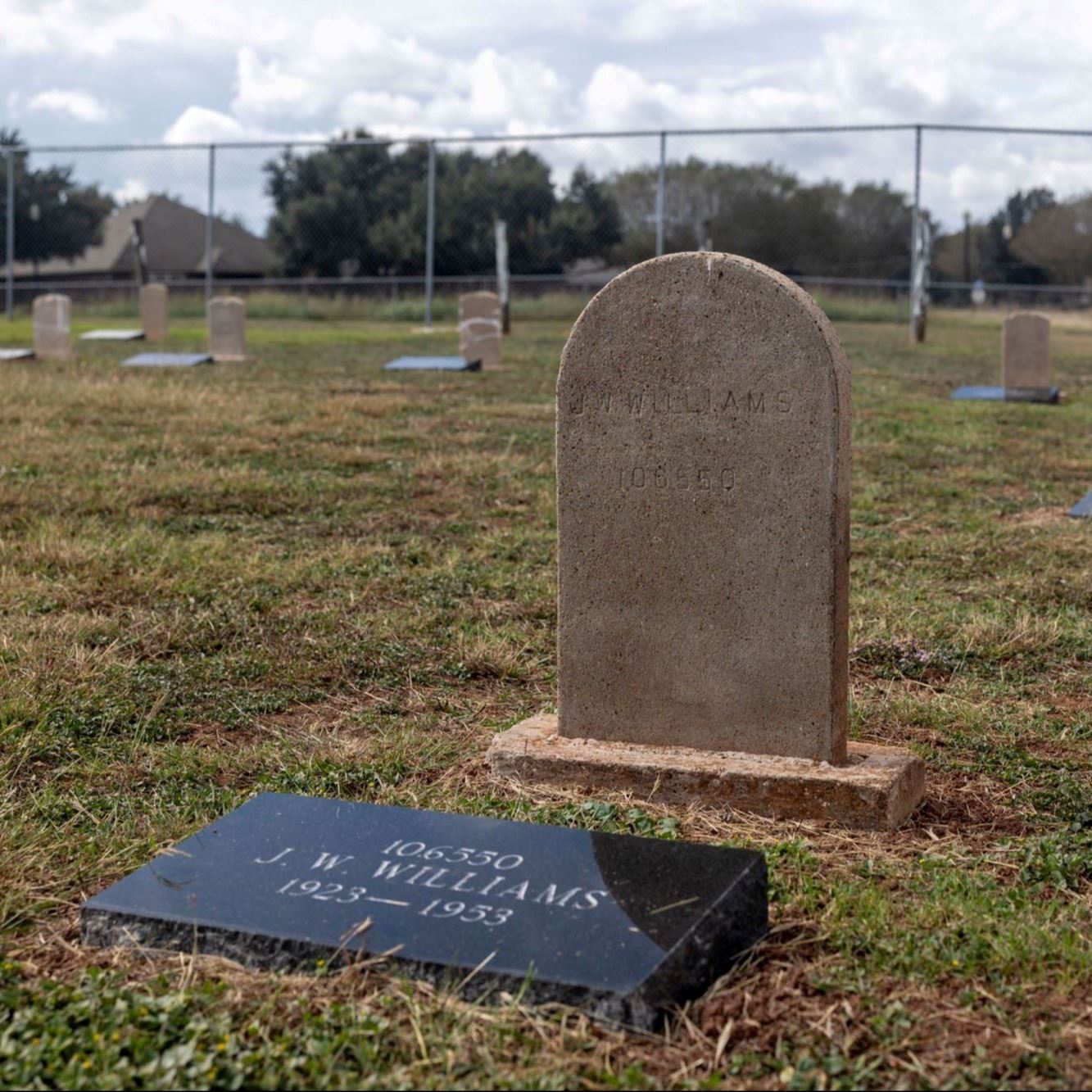 Post-Restoration of J. W. Williams's gravestone and pillow marker in 2023