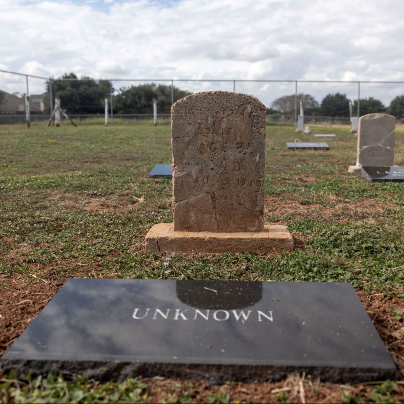 Post-Restoration of Unknown (Grave 10) gravestone and pillow marker in 2023