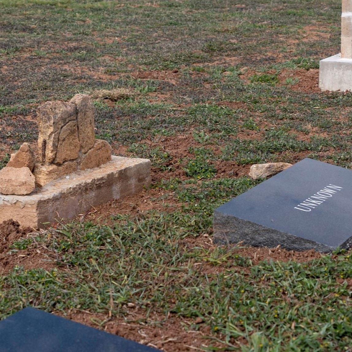 Post-Restoration of Unknown (Grave 30) gravestone and pillow marker in 2023